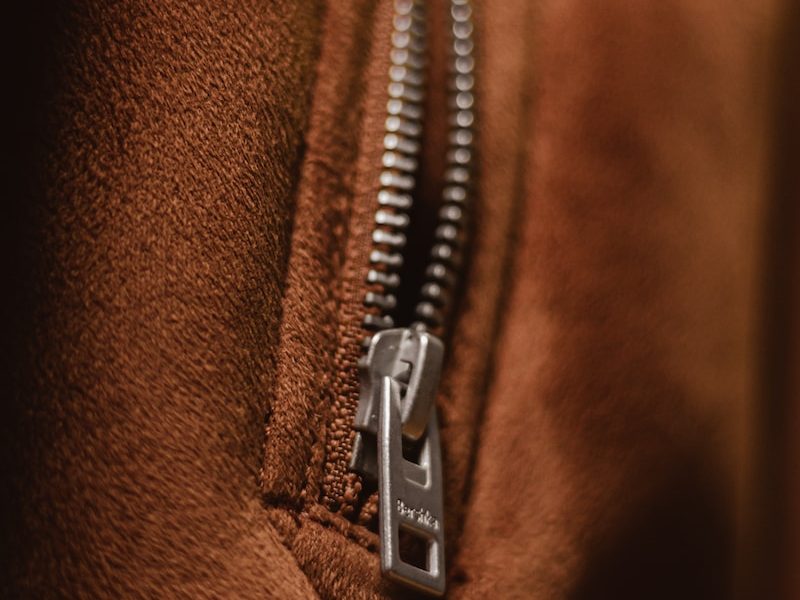 black and silver telephone on brown textile